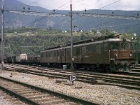 1974-03-13a  An Ae8/8 twin locomotive departing with a heavy goods for Berne