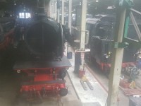 2019-07-20 11.46.56  -->  An overview in the depot's main shed. Sorry for the haze but the photo was taken thtough a dirty window.  In this album I describe the locos thematically rather than chronologically through the depot. From left to right 41 105, 23 023, 65 018 and in the distance you can just make out 01 1075.